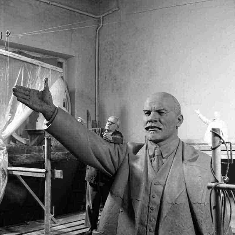 Sculptor Manizer works on a larger-than-life Lenin bronze statue in his studio