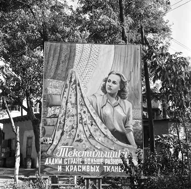 A vintage poster representing the Soviet Union, featuring iconic symbols that reflect its historical significance.